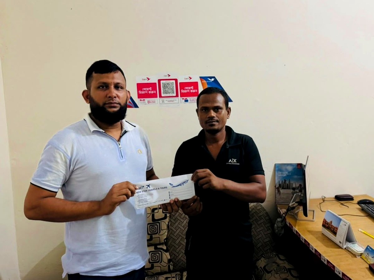 Customer receiving an air ticket from New Star Travels