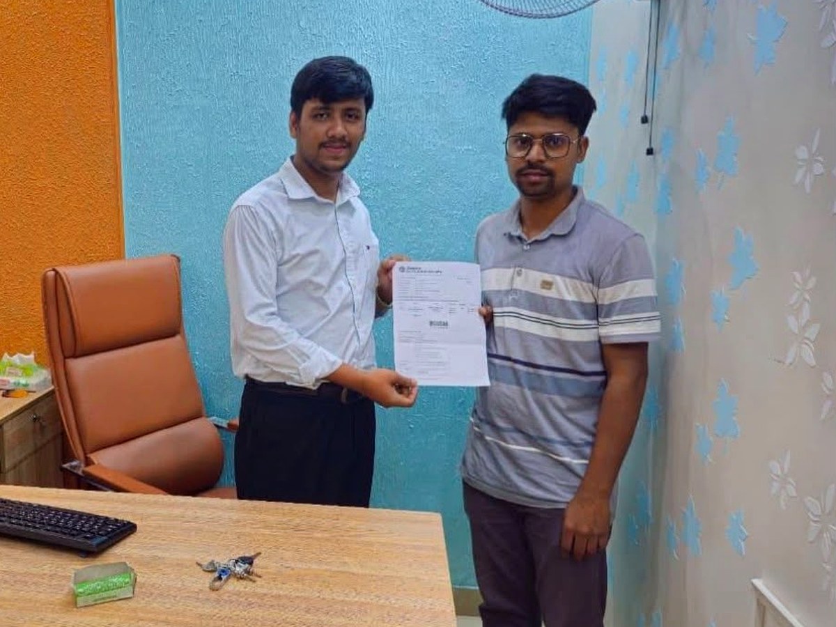 Happy customer with confirmed booking papers