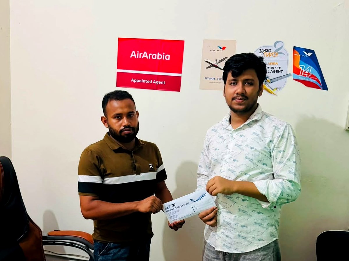 Customer receiving a New Star Travels ticket